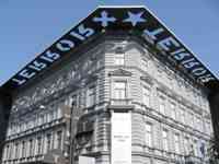 Building with cut-out metal sign on roof reading &ldquo;Terror House&rdquo;